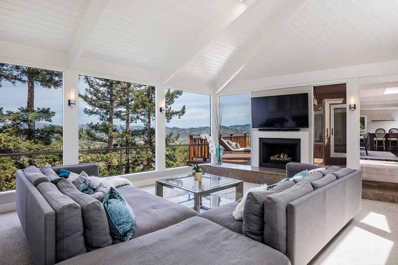 Living Room showing vaulted ceiling and large windows to views, 10 Woodhue Lane