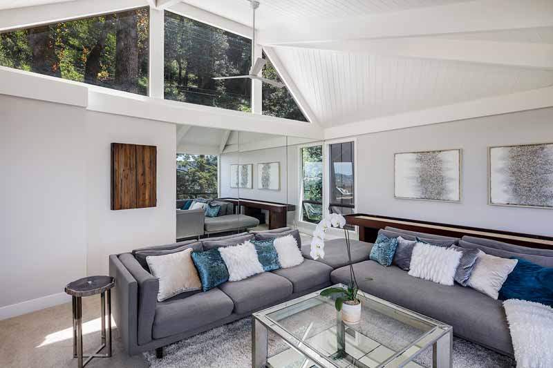 Living Room showing high windows to view of redwood trees, 10 Woodhue Lane
