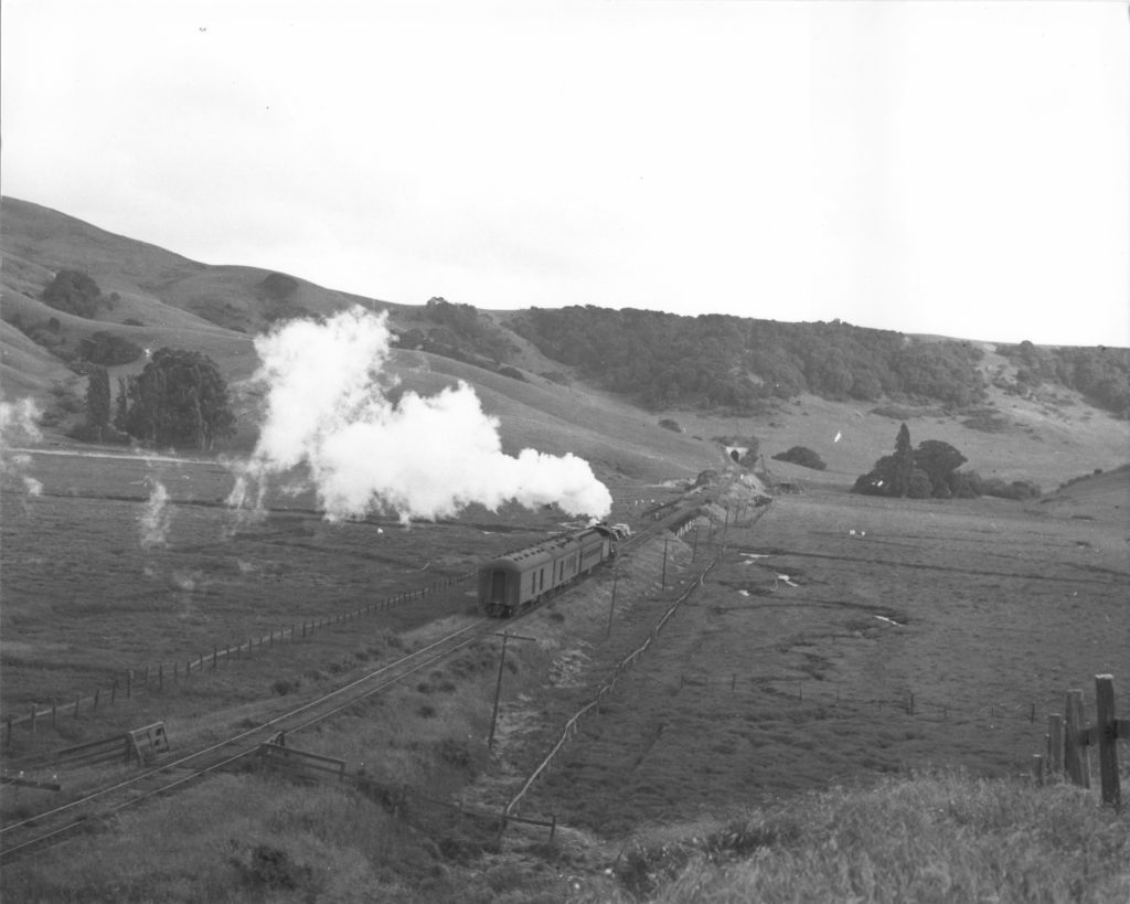 Train along the present Madera del Presidio Drive, Corte Madera, CA and though the mountain to Tiburon